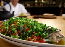 Whole Steamed Fish with Fermented Peppers and Scallions at Q by Peter Chang
