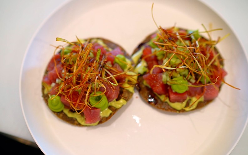 Two tostadas with vegetables.